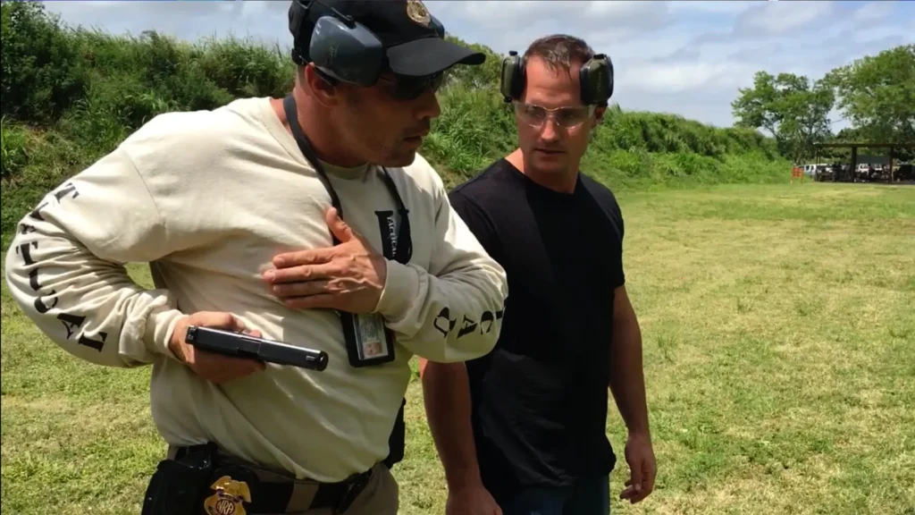 Tactical U instructor demonstrating concealed-carry safety judgment