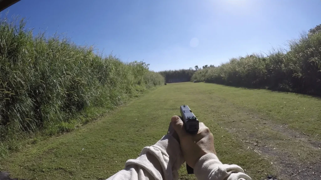 Tactical U defensive handgun safety drill used to explain live-fire boundaries and course expectations.