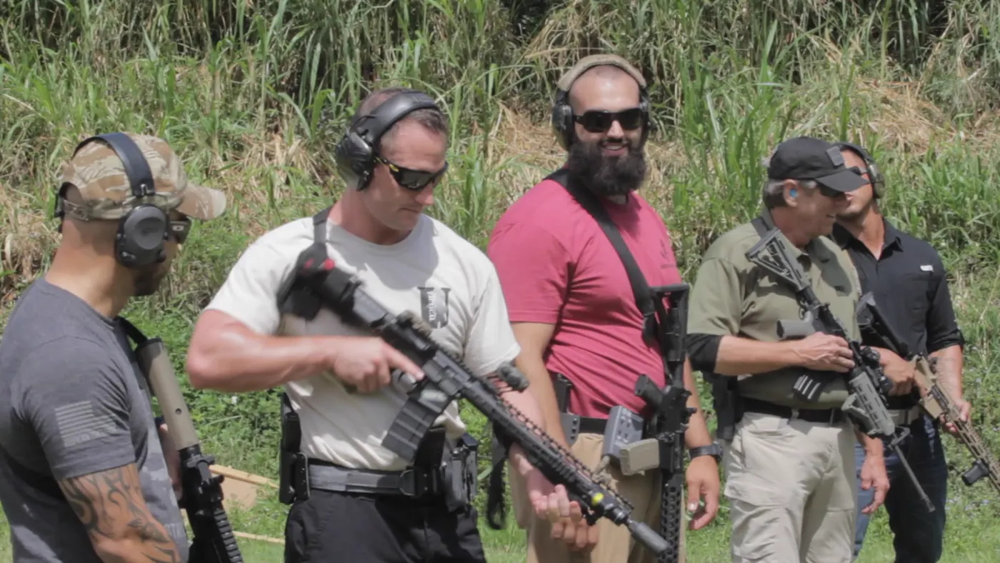 Tactical U students standing ready on the range during a live-fire training course in South Florida.