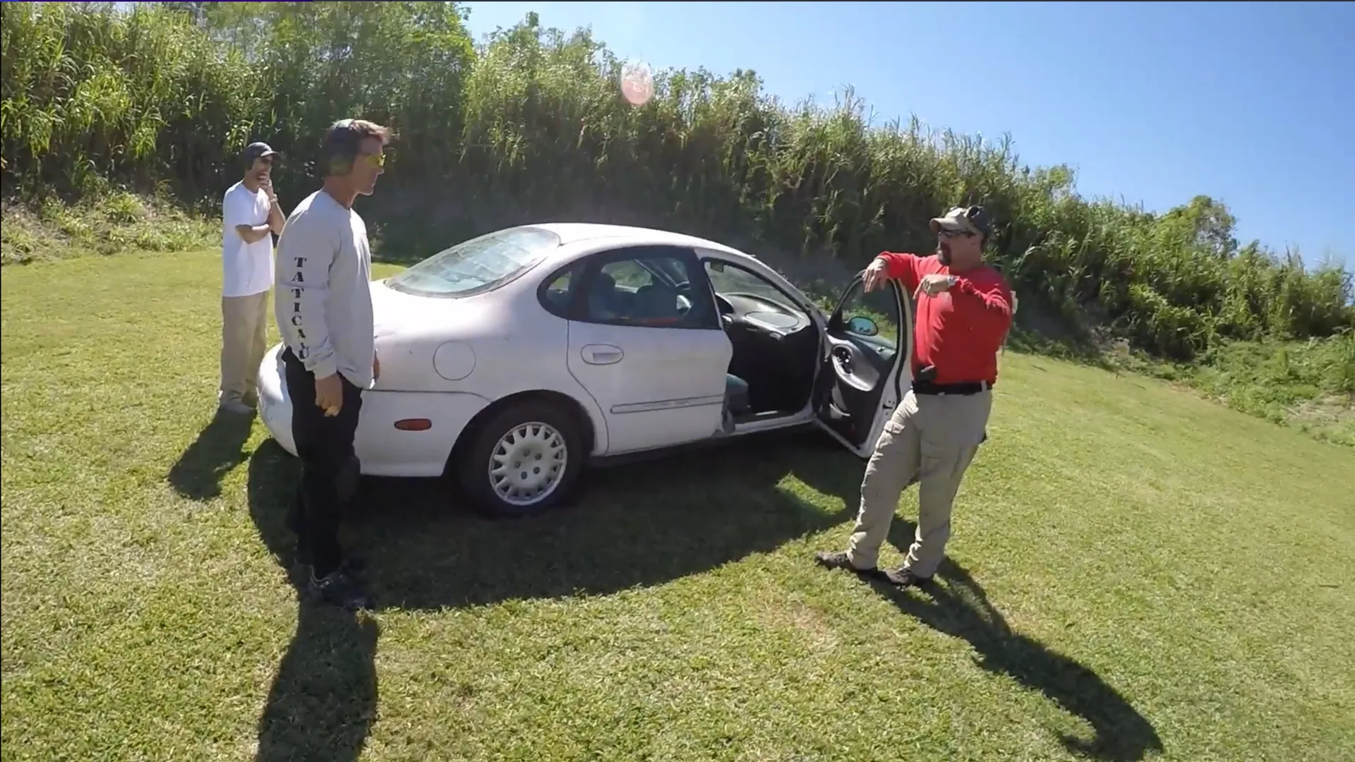 Stephen L. Cohen instructing Tactical U students during vehicle tactics training on a South Florida range