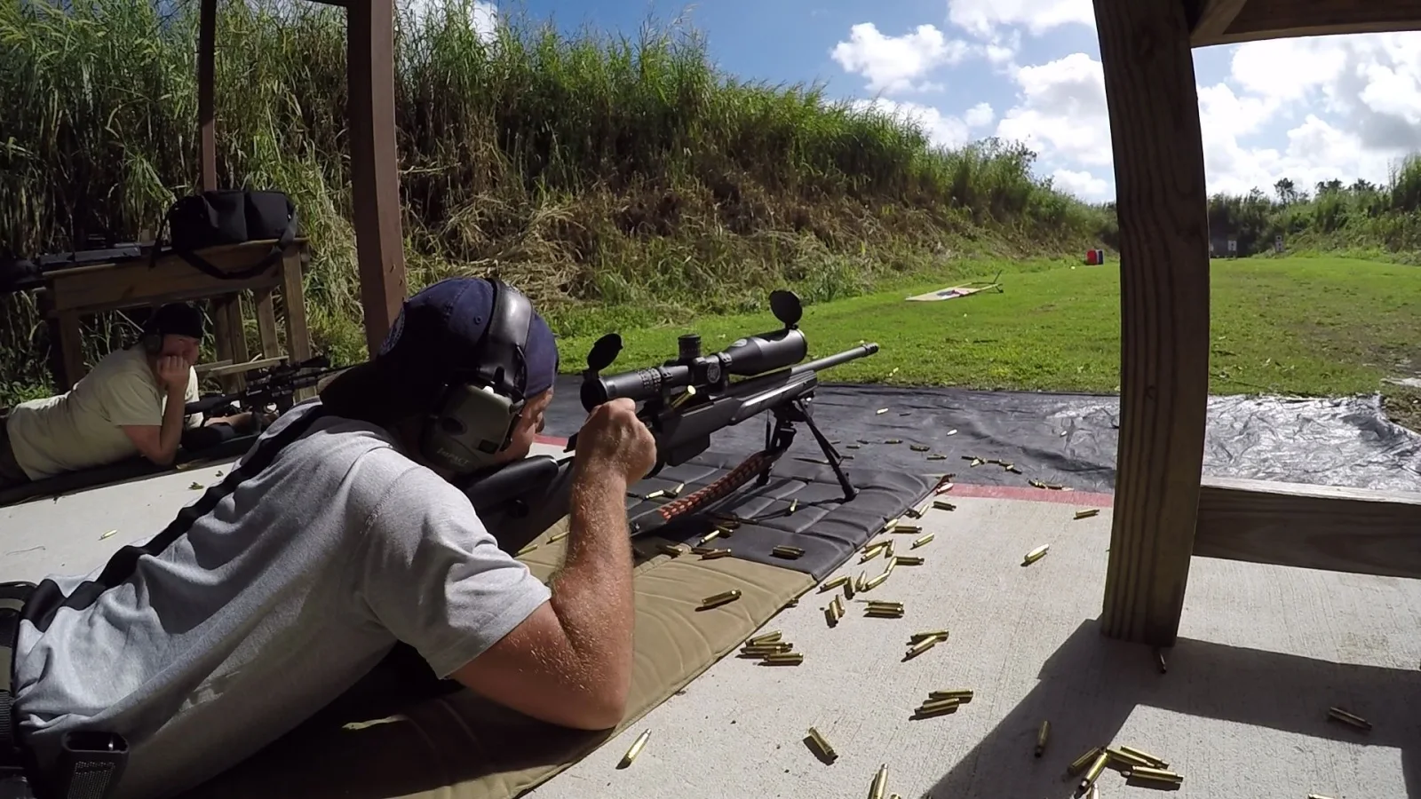Tactical U precision rifle student training from a supported position on a South Florida range