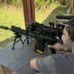 Tactical U student managing rifle and optic variables during precision training