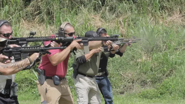 Friends training together during a Tactical U small group live-fire class