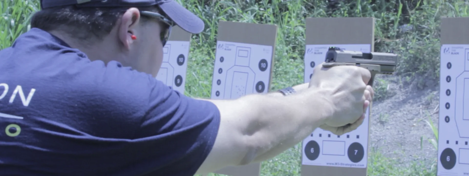 Tactical U student practicing live-fire handgun skills during firearms training in South Florida