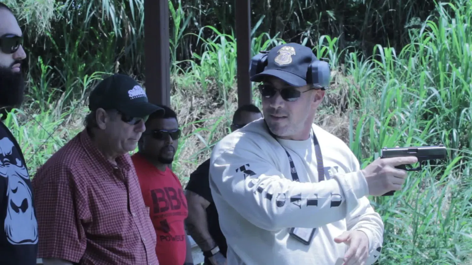 Stephen Cohen teaching pistol presentation to Tactical U students during South Florida handgun training