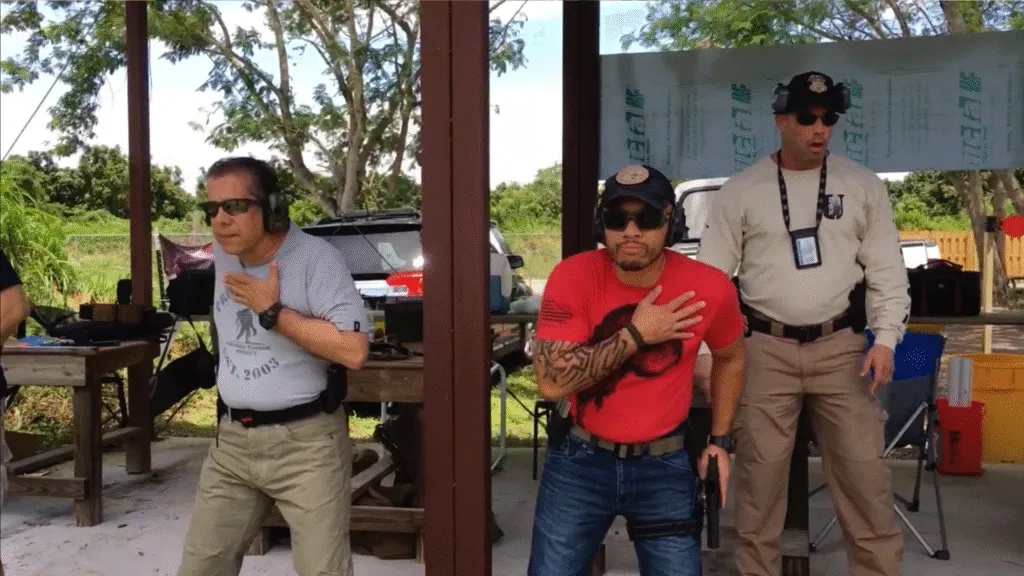 Stephen L. Cohen coaching a Tactical U handgun student during a live-fire training exercise