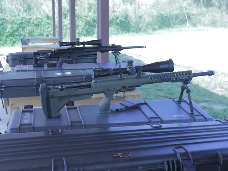 Precision rifle with optic on the bench