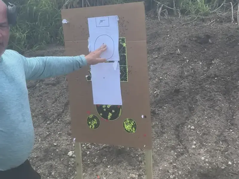 Instructor reviewing a target with a student